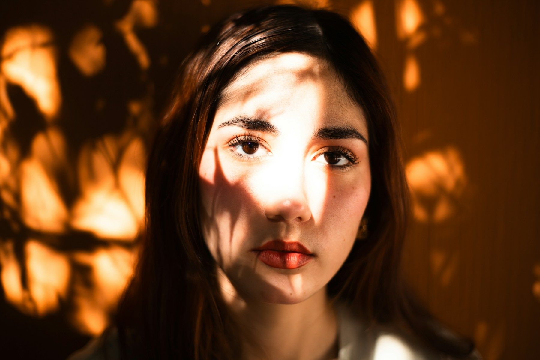 A creative professional photographed in soft natural light