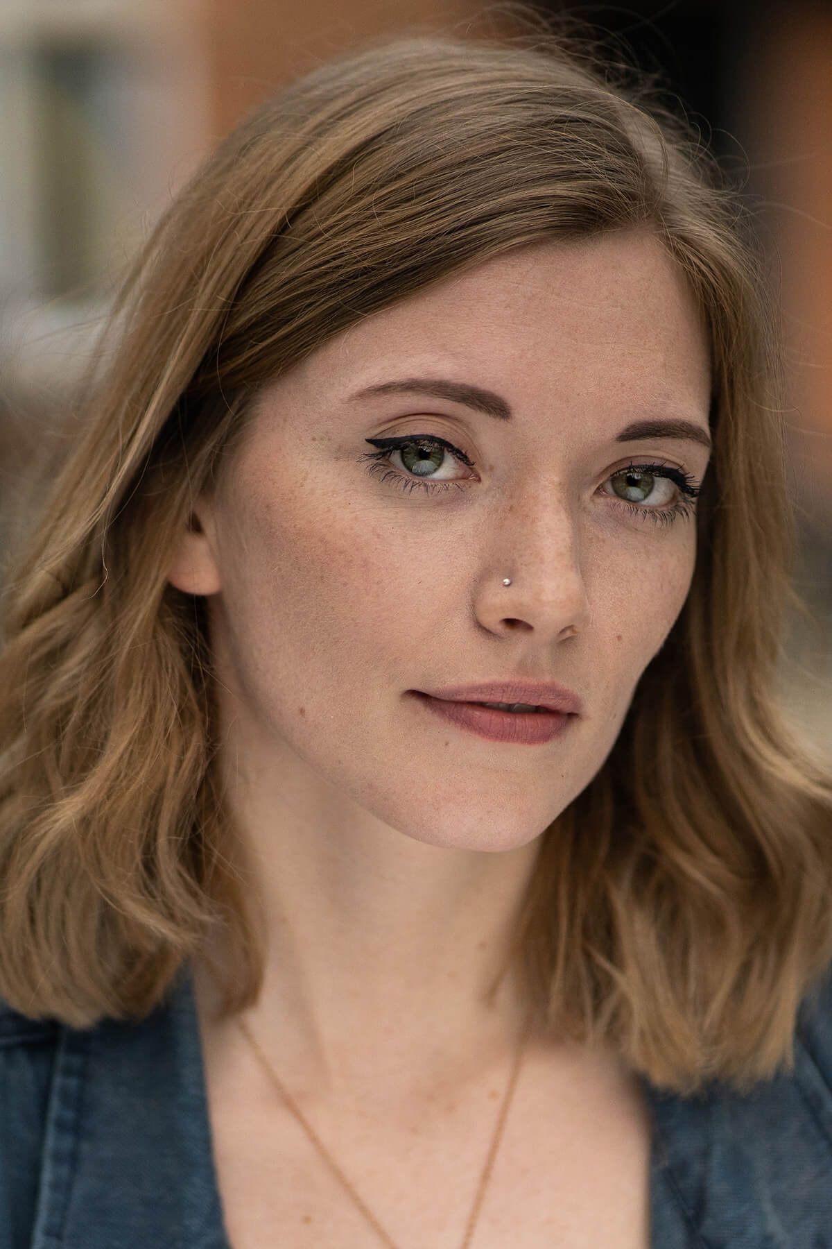 A close natural-light portrait of a young woman